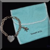J01. Tiffany & Co. sterling silver charm bracelet. 